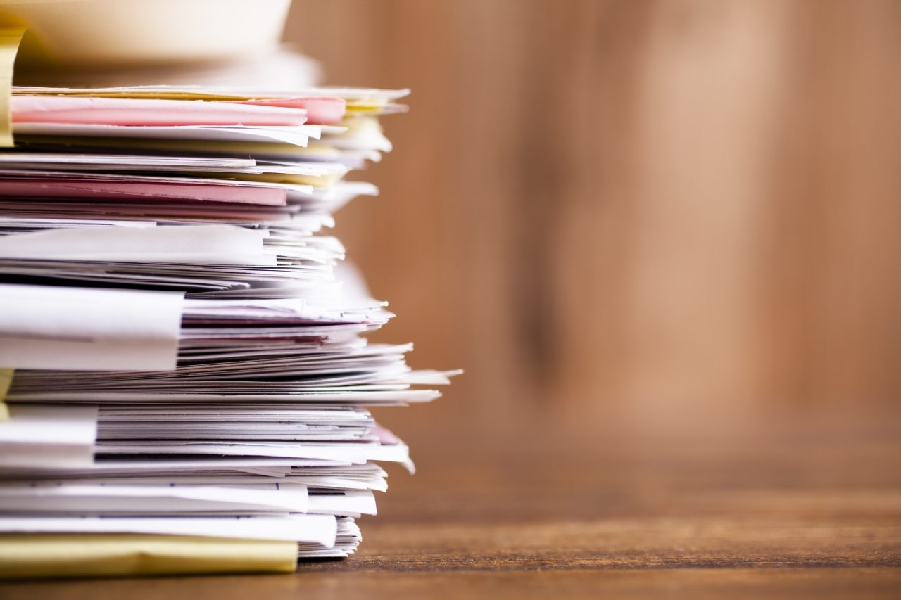 Pile of paper lying on a table